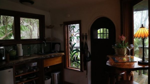door inside volcano treehouse hawaii big island kitchen